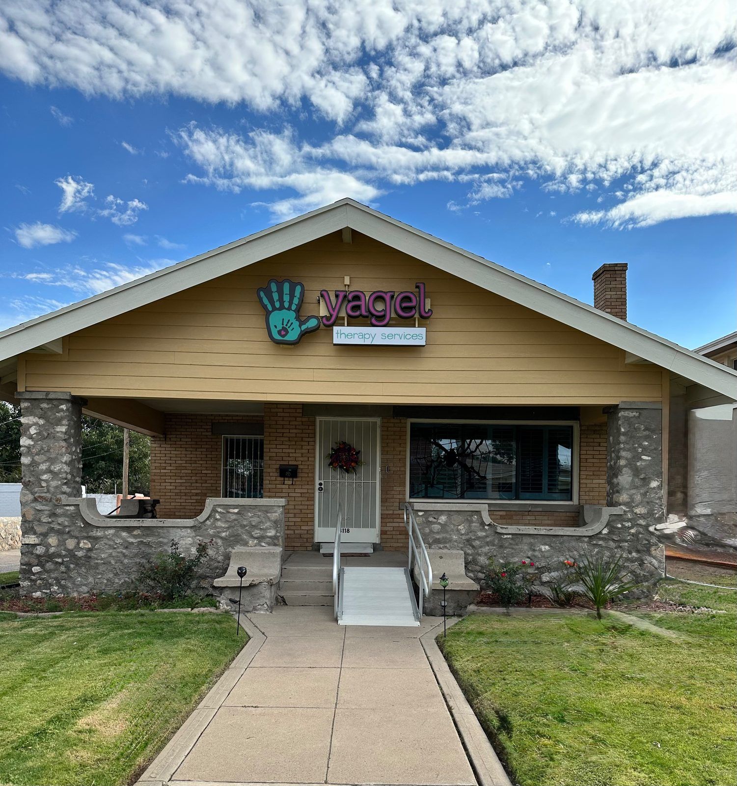 The Yagel Home Health office on Montana Avenue — a single-storey building with the Yagel Therapy Services sign above the porch.