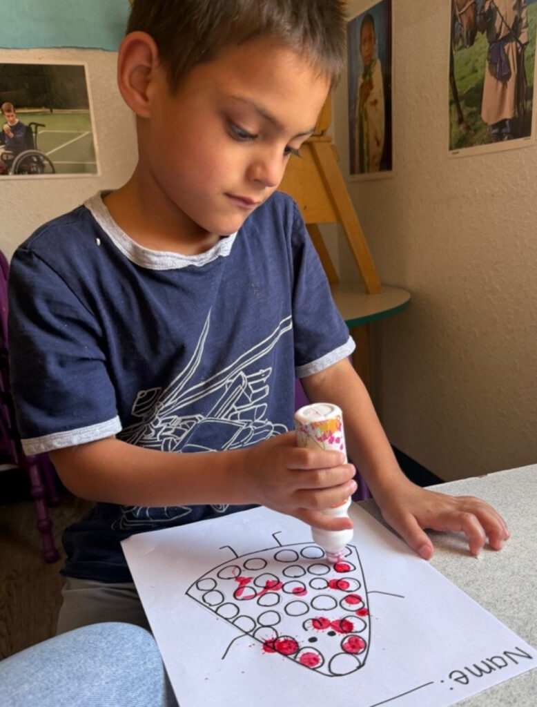 A child working with a Yagel Therapy therapist during a session.
